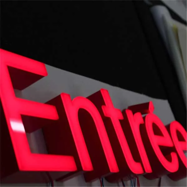 Red front-lit trimless letters with shaped aluminum returns — finished-letter reference