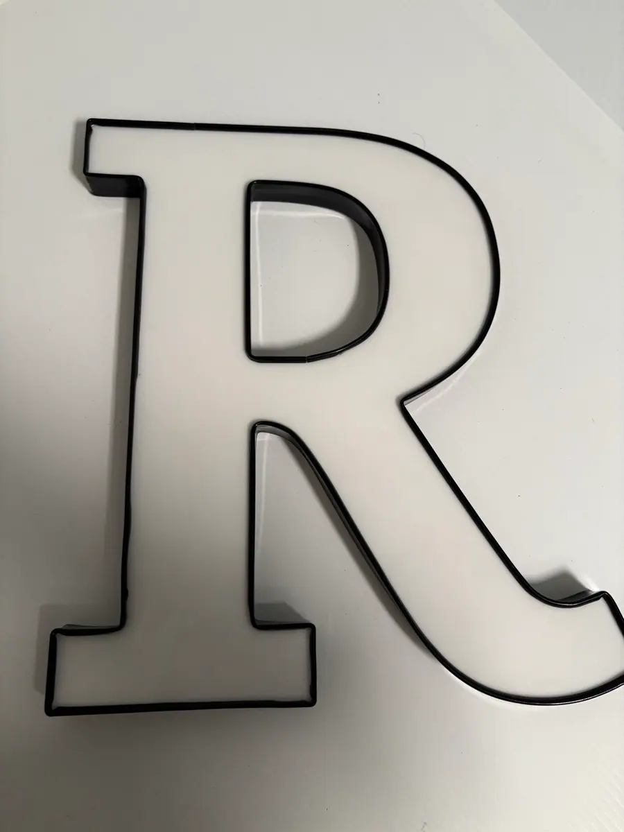 Trim-cap front-lit letters
